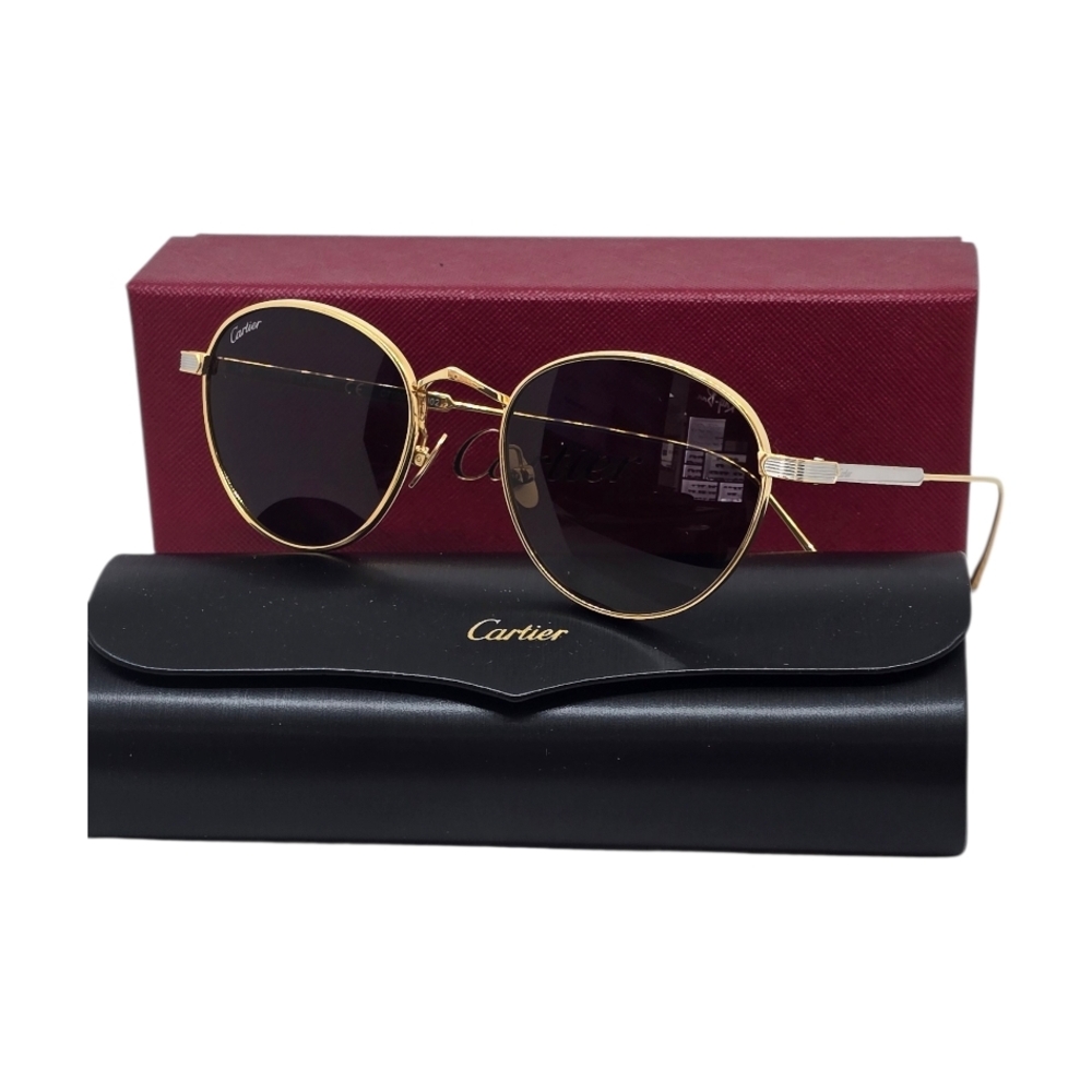 Cartier Gold sunglasses with brown lenses
